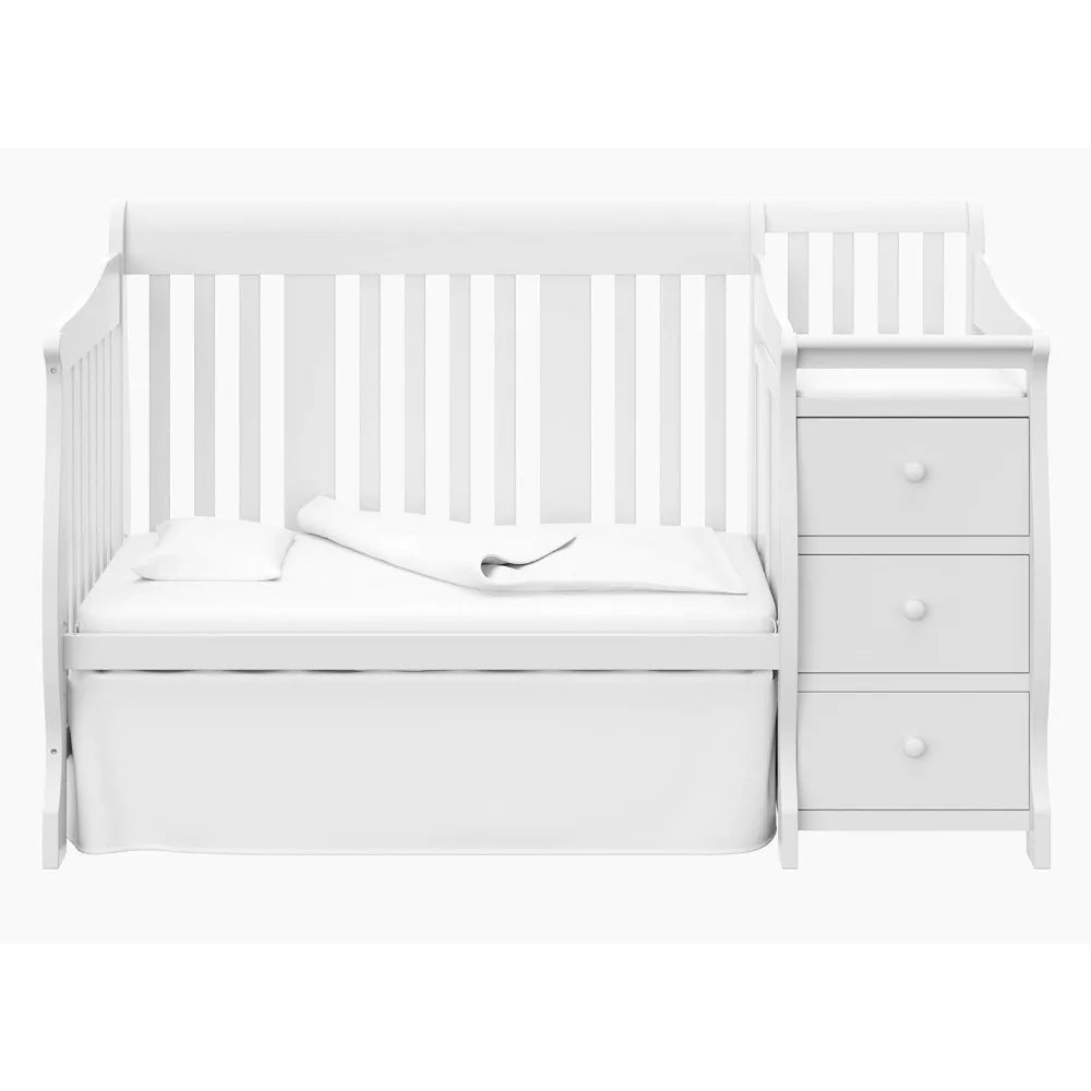 Cuna convertible 5 en 1 Storkcraft Portofino y cambiador (blanco): cambiador combinado con cajón, se convierte en cama para niños pequeños